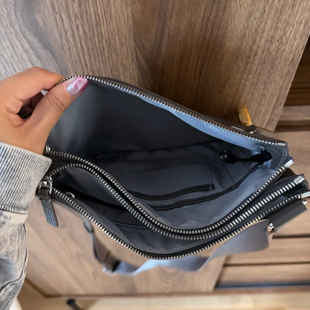 Tumi voyageur tula crossbody bag